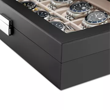 Ditur Kellorasia, valmistusmateriaali Musta Puu, tilaa 12 Kelloa kellolle