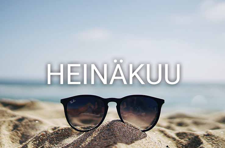 Aurinkolasit rannalla ja teksti hein&auml;kuu